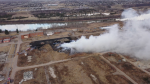 An aerial image of a large grass fire near Hayter Road in east Edmonton the morning of April 15, 2024. (Cam Wiebe / CTV News Edmonton)