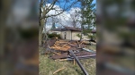 Roof debris is shown in the aftermath of the storm. (Source: Kevin Sprague/Northern Tornado Project)