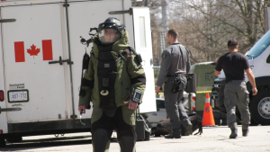 A member of Waterloo Regional Police Service's Explosives Disposal Team is seen on Ontario Street in Guelph on April 15, 2024. (Dave Pettitt/CTV Kitchener)