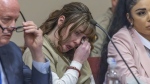 Hannah Gutierrez-Reed wipes her tears at her sentencing hearing in state district court in Santa Fe, New Mexico, on Monday, April 15, 2024. (Luis Sanchez Saturno/Santa Fe New Mexican via AP Pool)