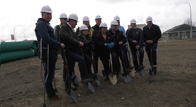 Mayor Lilia Hansen, MLA Dan Davies, members of Fort St. John city council, and staff from VRS Communities put shovels in the ground to mark the start of construction on the Harlequin City Centre.