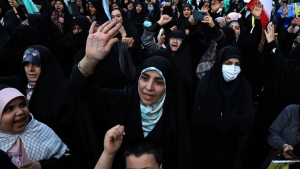 Iranian demonstrators chant slogans during a anti-Israeli gathering at the Felestin (Palestine) Sq. in Tehran, Iran, Monday, April 15, 2024. (AP Photo/Vahid Salemi)