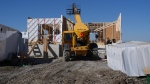 Work continues at a new housing development in Belleville, Ont., on Friday, March 1, 2024. THE CANADIAN PRESS/Chris Young