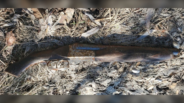 A sawed-off shotgun found on a beach in Gimli, Man. is shown in an undated photo provided by Manitoba RCMP.