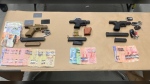 A variety of contraband seized by Toronto police as part of a carjacking investigation is shown. (Toronto Police Service)
