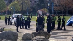 Police and park rangers are seen in CRAB Park on Tuesday, April 16, 2024. 