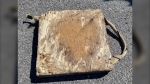 OPP say this piece of debris fell from a vehicle on Highway 417 April 16, 2024, and damaged three other vehicles. (OPP/X)