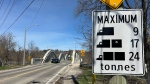 New signage, indicating the heavy vehicle ban, is seen near the Freeport Bridge in Kitchener on April 16, 2024. (Heather Senoran/CTV Kitchener)