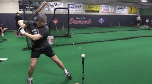 Chatham, Ont. native Spencer Marcus takes some swings off the tee as he prepares to suit up for his hometown team in their inaugural season in the Intercounty Baseball League on April 16, 2024. (Brent Lale/CTV News London)