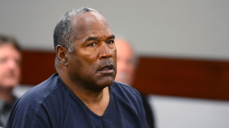 FILE - In this May 14, 2013, file photo, O.J. Simpson appears at an evidentiary hearing in Clark County District Court in Las Vegas. (Ethan Miller via AP, Pool, File)