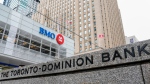 TD Bank and Bank of Montreal signage is pictured in the financial district in Toronto, Friday, Sept. 8, 2023. THE CANADIAN PRESS/Andrew Lahodynskyj