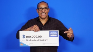 Ethelbert Jean-Pierre of Sudbury is $100,000 richer after winning with Instant Gold Pursuit. (Supplied)