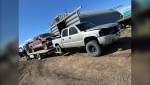 A search of a rural property in Vulcan County led to the recovery of 12 stolen pickup trucks, among other items. (Photo courtesy Vulcan RCMP)