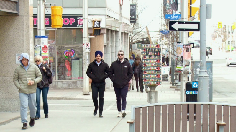 People walk down Bank Street in downtown Ottawa. April 17, 2024. (Austin Lee/CTV News Ottawa) 