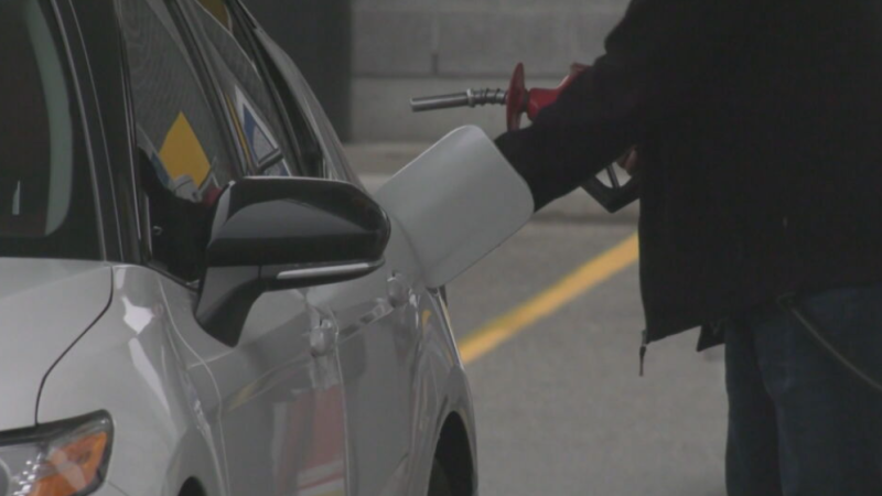 A driver prepares to pump gas as prices are set to spike at midnight on April 17, 2024. (Stefanie Davis/CTV News)