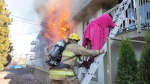 Video shows woman rescued from fire
