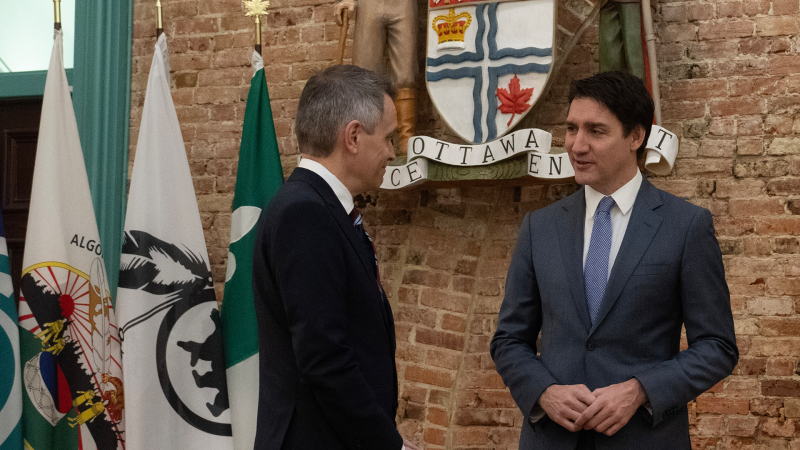 Prime Minister Justin Trudeau speaks with Ottawa Mayor Mark Sutcliffe at city hall, Thursday, April 18, 2024 in Ottawa. (THE CANADIAN PRESS/Adrian Wyld)