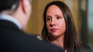 Saskatchewan Teachers' Federation president Samantha Becotte looks on while speaking to a member of the media after the release of 2024-2025 Saskatchewan budget in Regina, on Wednesday, March 20, 2024. THE CANADIAN PRESS/Heywood Yu
