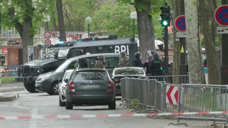 French police are seen at Iranian consulate in Paris where a man was threatening to blow himself up on April 19, 2024, according to Europe 1 radio and BFM TV. (Reuters)