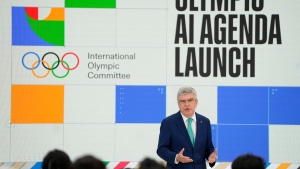Thomas Bach, IOC President speaks at the International Olympic Committee launch of the Olympic AI Agenda at Lee Valley VeloPark, in London, Friday, April 19, 2024.(Kirsty Wigglesworth / AP Photo)
