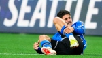 CF Montreal's Matias Coccaro Cóccaro holds his lower leg during the first half of the team's MLS soccer match against the Seattle Sounders, Saturday, April 6, 2024, in Seattle. (THE CANADIAN PRESS/AP/Lindsey Wasson)