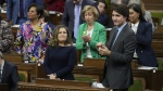 Deputy Prime Minister and Minister of Finance Chrystia Freeland receives applause from Prime Minister Justin Trudeau, right, and other members of the Liberal party after she presented the federal budget in the House of Commons in Ottawa on Tuesday, April 16, 2024. THE CANADIAN PRESS/Adrian Wyld