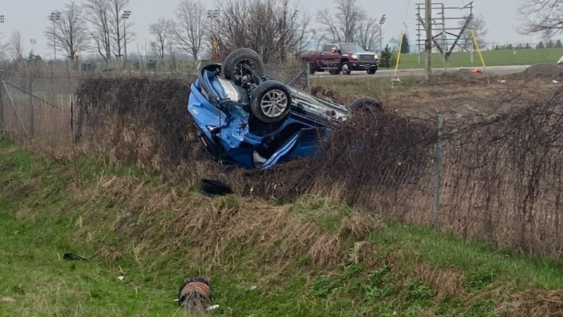 A vehicle rolled onto its roof following a collision on Highway 400 in Barrie, Ont., on Fri., April 19, 2024. (Source: OPP)