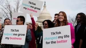 Devotees of TikTok gather at the Capitol in Washington, as the U.S. House passed a bill that would lead to a nationwide ban of the popular video app if its China-based owner doesn't sell, Wednesday, March 13, 2024. (AP Photo/J. Scott Applewhite)