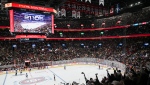 Fans cheer on as the attendance number is displayed on the big screen during third period PWHL hockey action between Toronto and Montreal at the Bell Centre in Montreal, Saturday, April 20, 2024. (Graham Hughes, The Canadian Press)