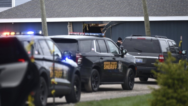 A driver crashed a vehicle through a building where a children's birthday party was taking place in Berlin Township, Mich. (Kathleen Kildee/Detroit News via AP)