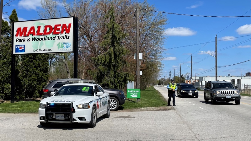 Police are shown redirecting traffic for the City of Windsor's 54th annual Earth Day event at Malden Park on Apr. 21, 2024. (Michelle Maluske/CTV News Windsor)