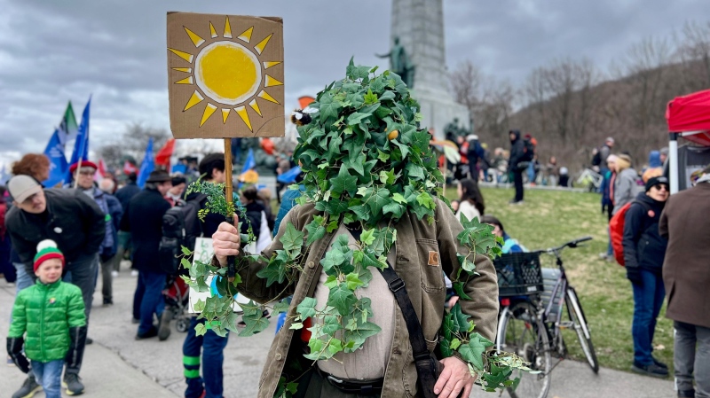 A protester gathers to speak against the Quebec government's environmental policies in Montreal on April 21, 2024. (Laurence Brisson Dubreuil, CTV News)