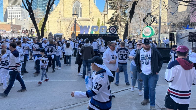 Winnipeg fans take over Donald Street for the Whiteout Street Party ahead of Game 1 against the Colorado Avalanche in the Stanley Cup Playoffs on April 21, 2024. (Devon McKendrick/CTV News Winnipeg)