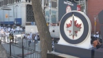 Winnipeg Jets fans start to show up for the Whiteout Street Party on Donald Street on April 21, 2024. (Zachary Kitchen/CTV News Winnipeg)