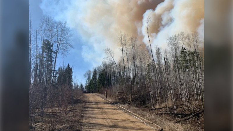 Smoke can be seen rising from a wildfire near Saprae Creek Estates, south of Fort McMurray. (Photo: Government of Alberta)