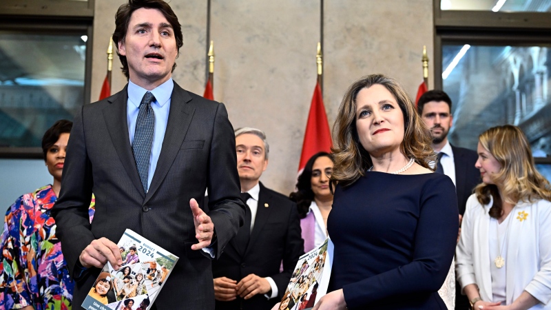Prime Minister Justin Trudeau, Deputy Prime Minister and Minister of Finance Chrystia Freeland and cabinet ministers pose for a photo before the tabling of the federal budget on Parliament Hill in Ottawa, on Tuesday, April 16, 2024. THE CANADIAN PRESS/Justin Tang