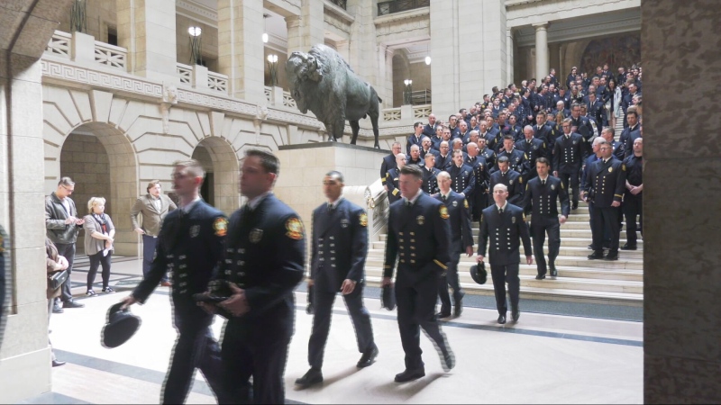 Manitoba firefighters gather for a memorial march at the Manitoba Legislature on April 22, 2024. The Manitoba government announced it will be funding mental health support for first responders, following the recent death of a Winnipeg firefighter. (Joseph Bernacki/CTV News Winnipeg)