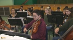 Students play instruments in this file photo.