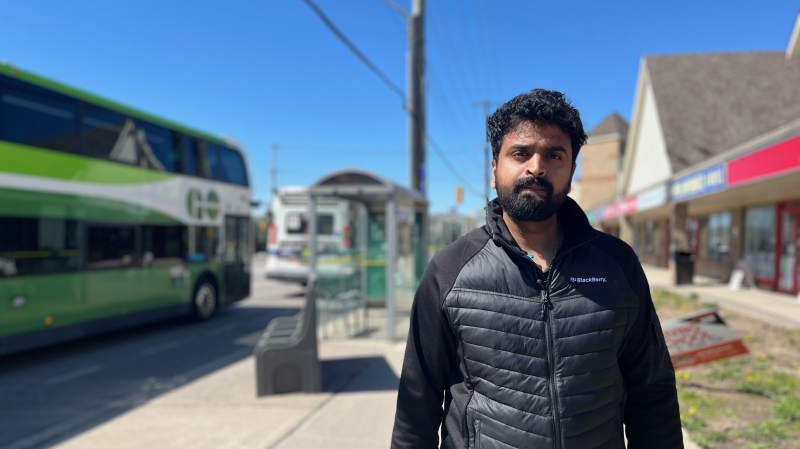 Praveen Narendran stands near the bus stop on University Avenue where he realized he left his laptop on the bus. (Stefanie Davis/CTV Kitchener)