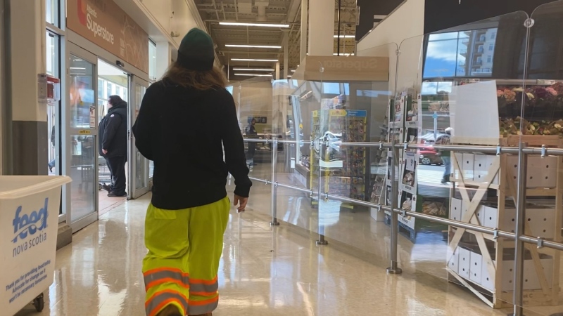 Plexiglass barriers at the exit of a Superstore are pictured. (Hafsa Arif/CTV Atlantic)