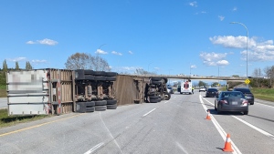An overturned semi is seen on Highway 99 following a crash in Delta, B.C., on April 22, 2024. (Source: Delta Police Department) 