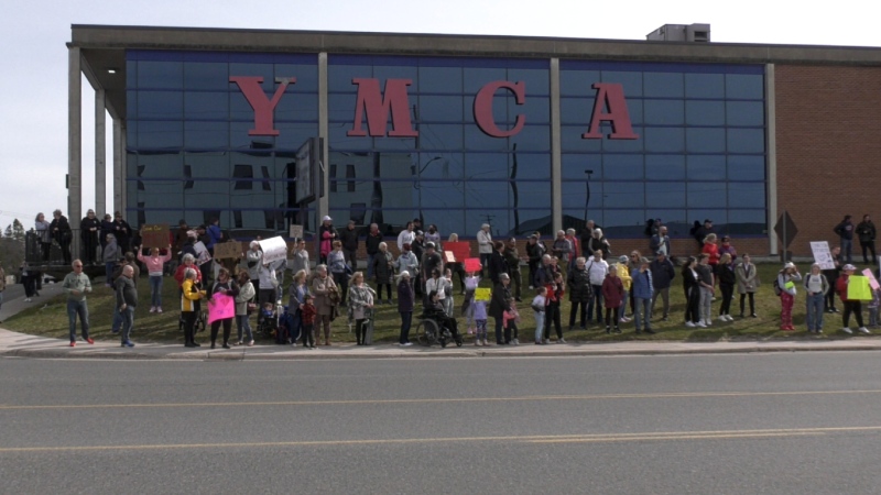 Almost 100 people dedicated to saving the Sault Ste. Marie YMCA from closure gathered in front of the facility in a showing of support on April 22, 2024. (Mike McDonald/CTV News Northern Ontario)