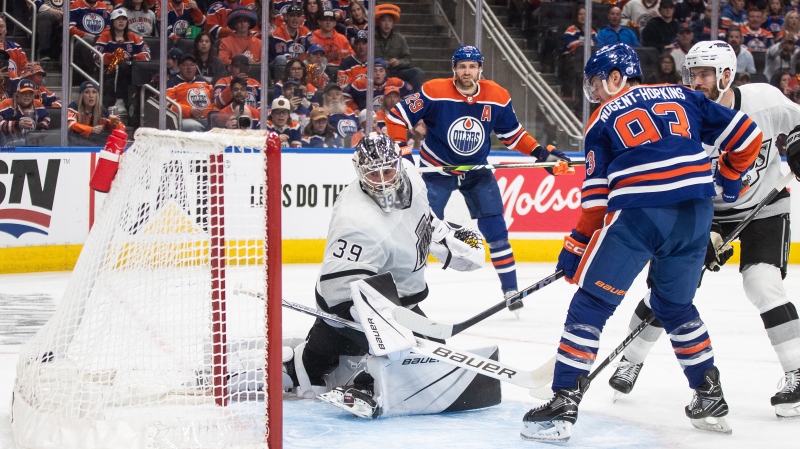 Los Angeles Kings goalie Cam Talbot (39) is scored on by Edmonton Oilers' Ryan Nugent-Hopkins (93) during second period of Game 1 first round NHL Stanley Cup playoff hockey action in Edmonton, Monday, April 22, 2024. (Jason Franson / The Canadian Press) 