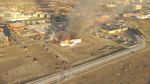 Smoke billows from the fire that destroyed Edmonton's historical Hangar 11 at the former municipal airport site on April 22, 2024. (Sean McClune / CTV News Edmonton) 
