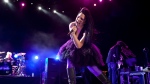 Amy Lee, lead singer of American rock band Evanescence, performs during the Rock in Rio music festival in Lisbon, Friday, May 25 2012. (AP Photo/Armando Franca)