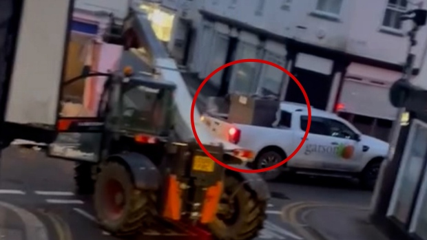 Police in the U.K. are searching for a group of suspects seen on video using a forklift to steal a cash machine from a bank.
