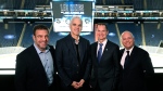 Los Angeles Kings president Luc Robitaille, centre, smiles at a news conference, Tuesday, November 14, 2023 at the Videotron Centre in Quebec City. The Los Angeles Kings will hold the final leg of their training camp at the Videotron Centre in Québec City from October 2 to 6, 2024, with two games against the Boston Bruins on October 3 and the Florida Panthers on October 5. From the left, Martin Tremblay, COO of Quebecor's Sports and Entertainment Group and president of Gestev, Luc Robitaille, Quebec Finance Minister Eric Girard and Quebec Minister Responsible for Infrastructure Jonathan Julien. THE CANADIAN PRESS/Jacques Boissinot
