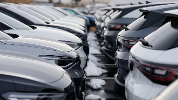 Unsold 2023 electric ID.4 sports-utility vehicles sit at a Volkswagen dealership Sunday, March 17, 2024, in Denver. (AP Photo/David Zalubowski)