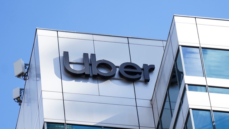 The Uber logo is pictured on their Toronto office, Feb. 14, 2024. THE CANADIAN PRESS/Arlyn McAdorey