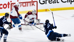 Winnipeg Jets' Vladislav Namestnikov (7) scores on Colorado Avalanche goaltender Alexandar Georgiev (40) during the first period in Game 1 of their NHL hockey Stanley Cup first-round playoff series in Winnipeg on Sunday April 21, 2024. (THE CANADIAN PRESS/Fred Greenslade)